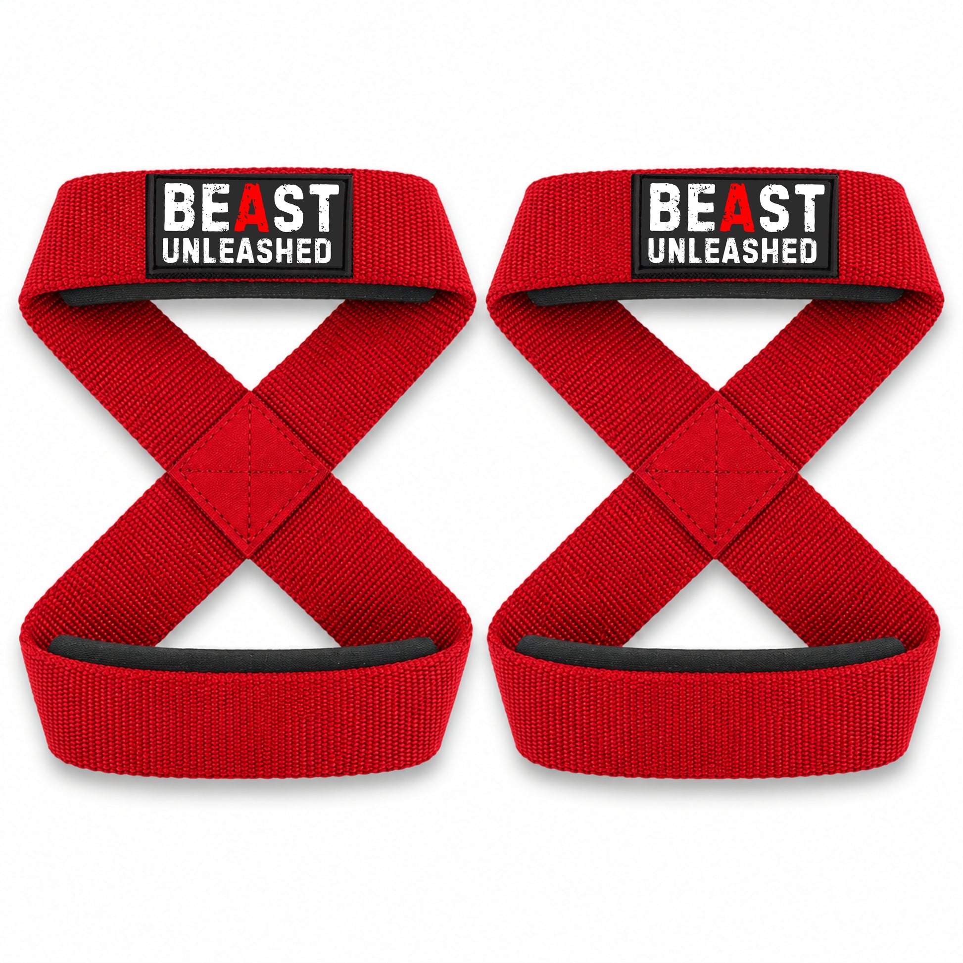 Two red crossover grip straps with black and white 'BEAST UNLEASHED' patches, displayed side-by-side on a white background.